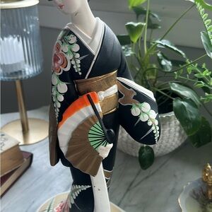 Elegant Black and Gold Geisha Figurine